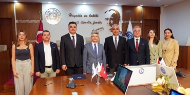 ege-universitesi-meslek-yuksekokulu-ve-izmir-dogalgaz-arasinda-sanayi-is-birligi-protokolu-imzalandi.jpg